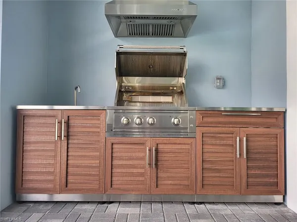 a close view of a sink and a microwave