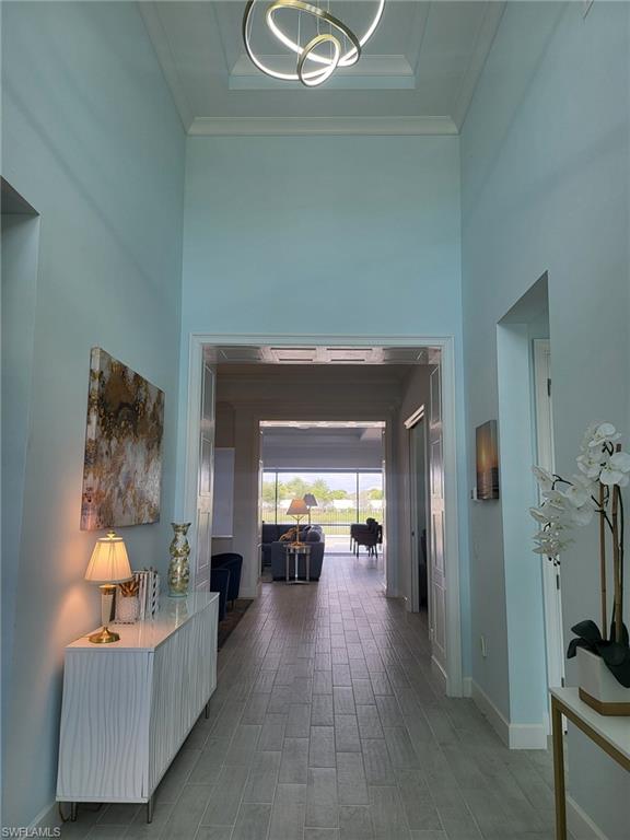 8770 Calypso Court Naples, FL 34113 - Photo 2 of 47 a view of a livingroom with furniture and a couch