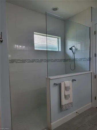 a bedroom with a bunk bed and a desk