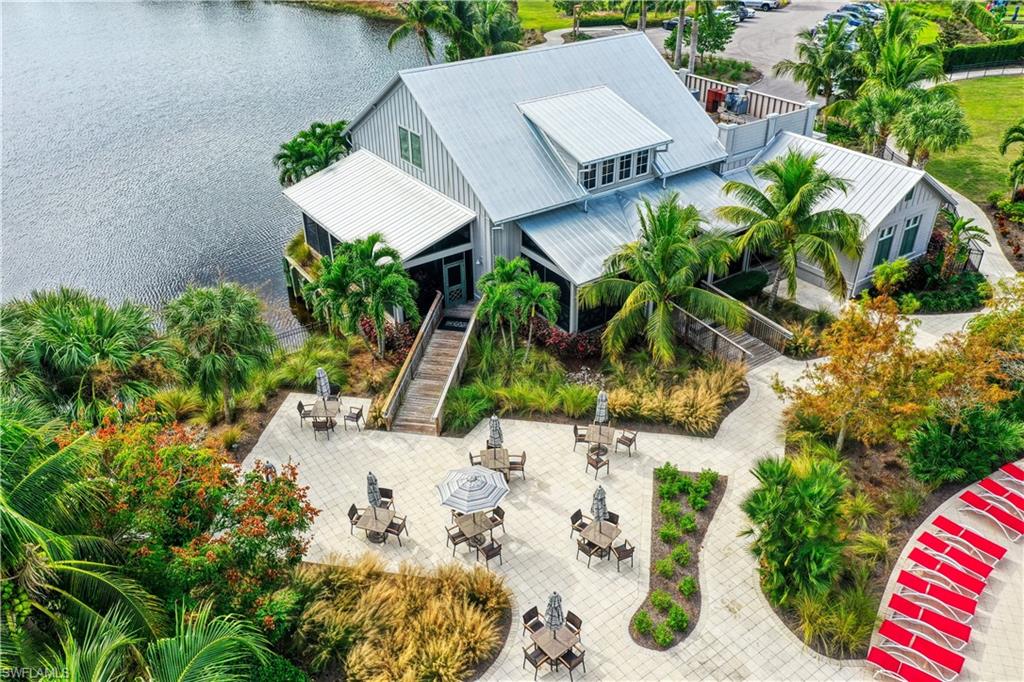 8770 Calypso Court Naples, FL 34113 - Photo 38 of 47 an aerial view of a house with a yard and garden