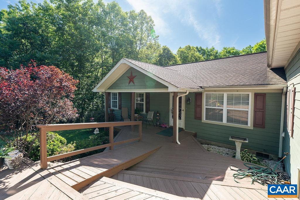 2851 Martin Kings Road Scottsville, VA 24590 - Photo 16 of 67 a front view of a house with a yard