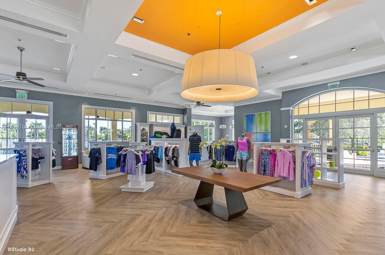 3322 Northwest 53rd Circle Boca Raton, FL 33496 - Photo 43 of 45 a view of a big room with dining table and chairs