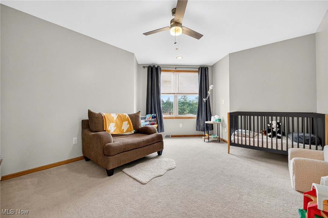 35748 Mills Road Avon, OH 44011 - Photo 24 of 44 Carpeted bedroom with baseboards and ceiling fan