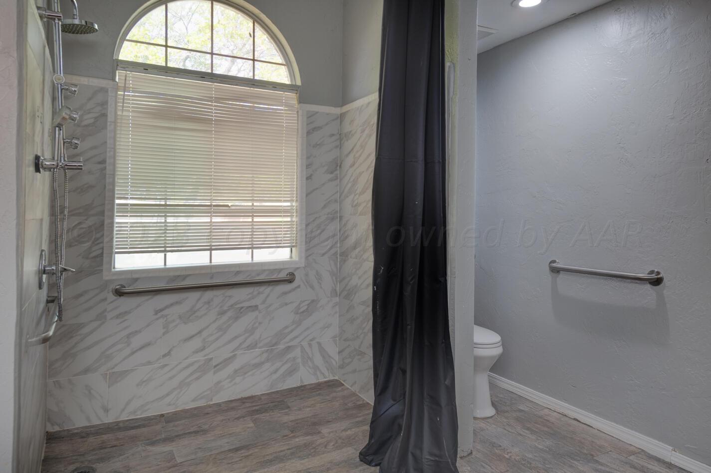 8101 Sheldon Road Amarillo, TX 79119 - Photo 16 of 24 Roll in Shower