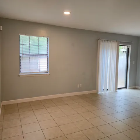 a kitchen with cabinets appliances and a sink