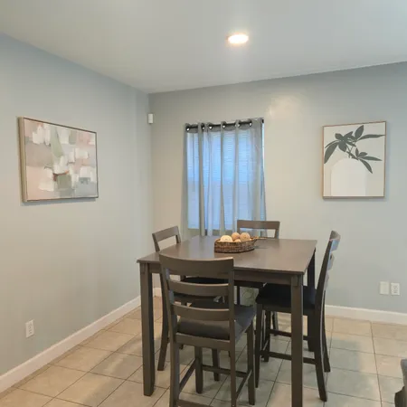 a view of a dining room with furniture
