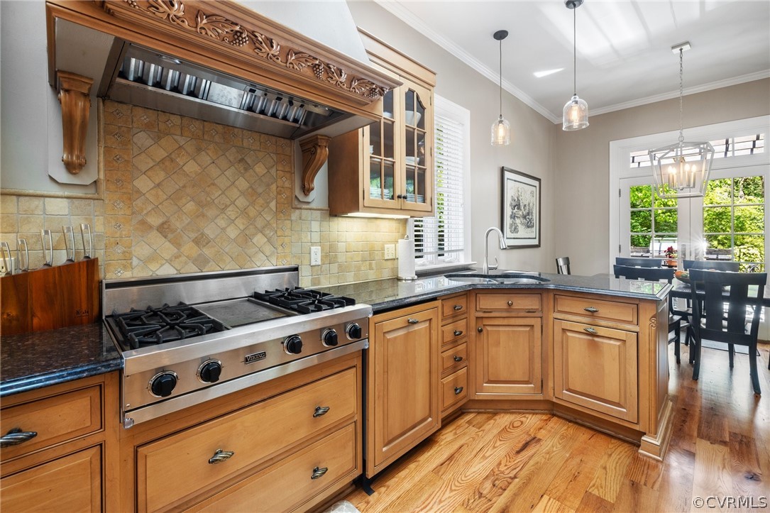 7215 Riverside Drive Richmond, VA 23225 - Photo 16 of 42 a kitchen with stainless steel appliances granite countertop a stove a sink and a microwave