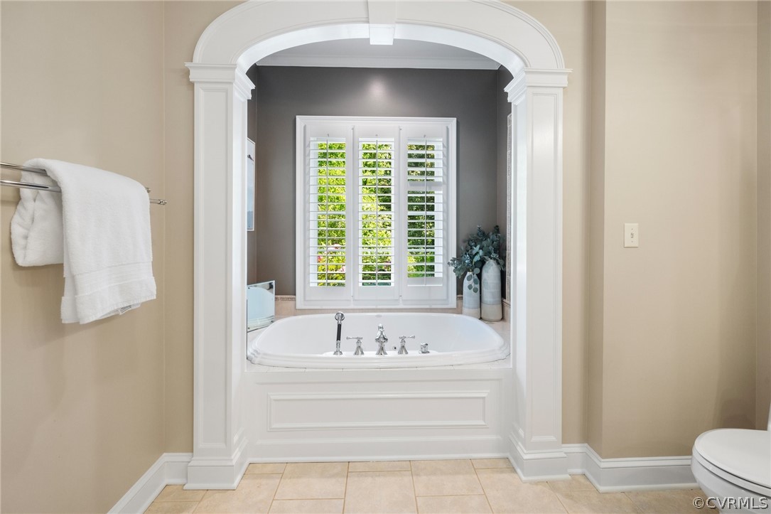 7215 Riverside Drive Richmond, VA 23225 - Photo 24 of 42 a bathroom with a bathtub and a window