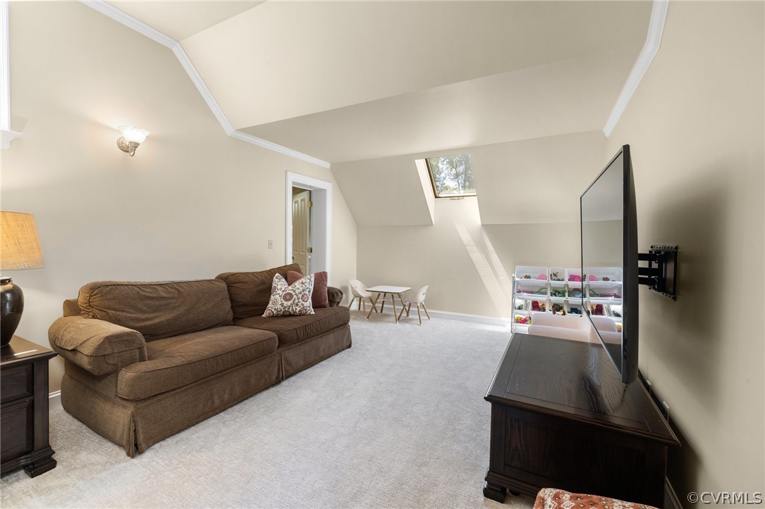 7215 Riverside Drive Richmond, VA 23225 - Photo 29 of 42 a living room with furniture and a flat screen tv