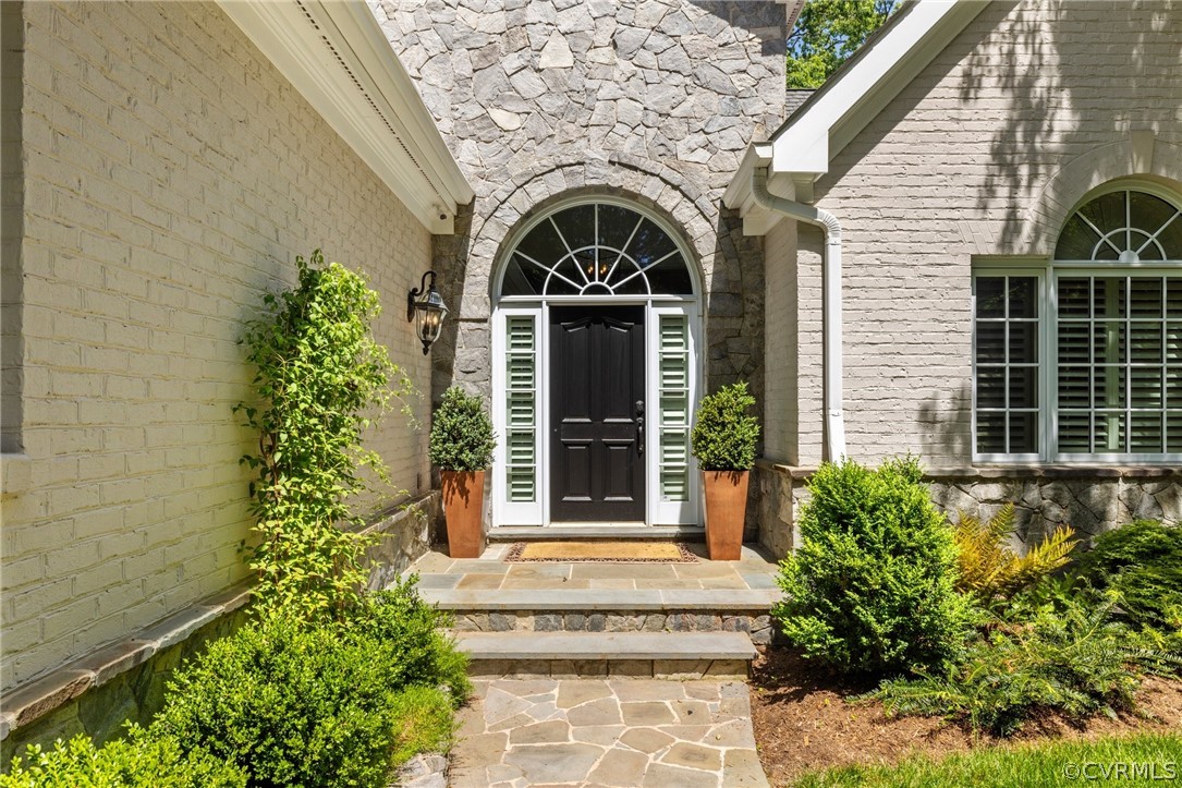 7215 Riverside Drive Richmond, VA 23225 - Photo 3 of 42 a view of a house with potted plants