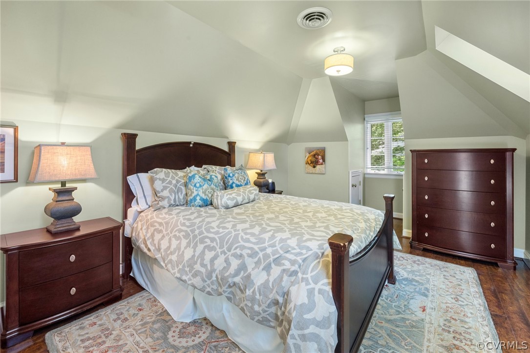 7215 Riverside Drive Richmond, VA 23225 - Photo 31 of 42 a bed room with a bed and a lamp