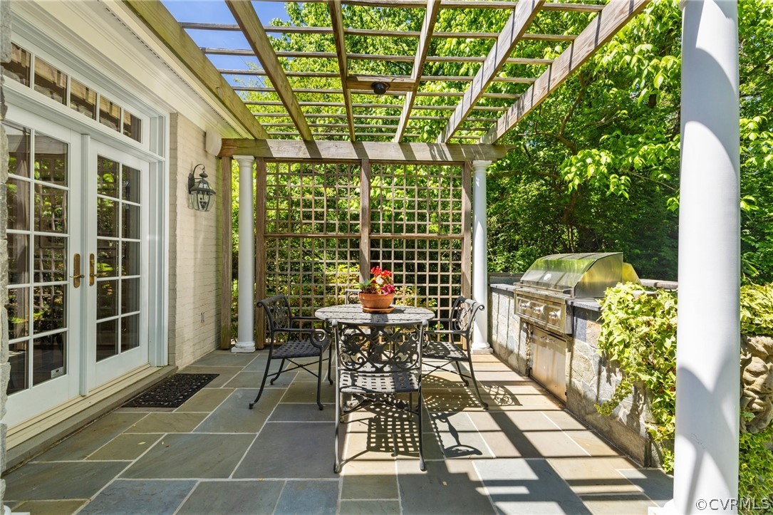 7215 Riverside Drive Richmond, VA 23225 - Photo 34 of 42 a view of a patio with table and chairs