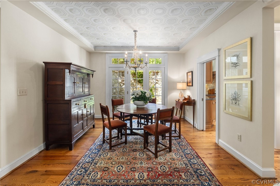 7215 Riverside Drive Richmond, VA 23225 - Photo 9 of 42 a view of a dining room with furniture window and wooden floor