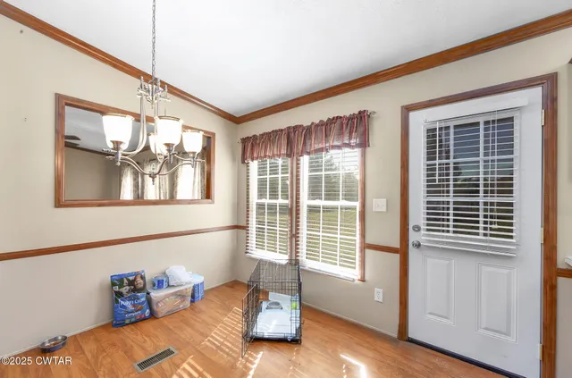 a bathroom with a double vanity sink and mirror