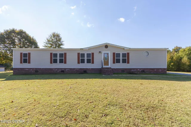 a view of a house with swimming pool
