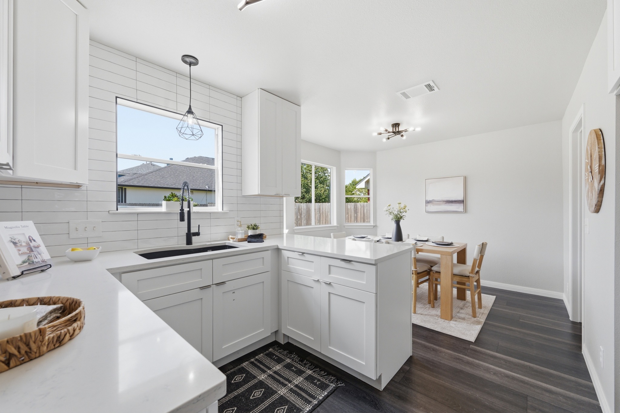 1504 Waterfall Avenue Leander, TX 78641 - Photo 8 of 25 A bright kitchen with a nearby breakfast nook for easy everyday meals.