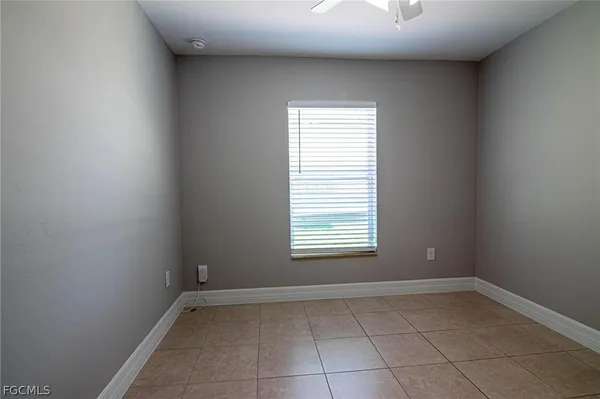 a view of a room that has a window in it