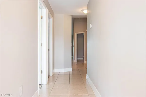 a view of a hallway with closet