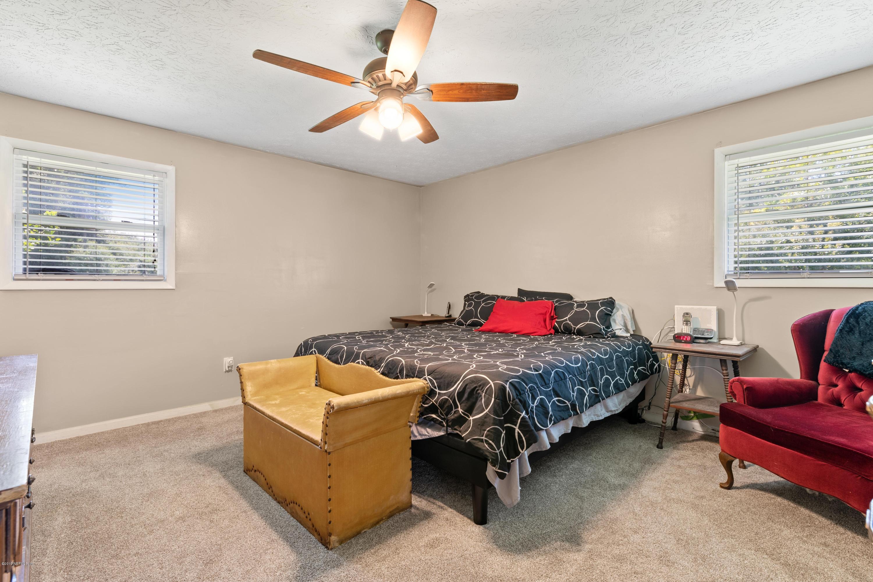 54152 Snyder Road Callahan, FL 32011 - Photo 23 of 39 a bedroom with furniture and windows