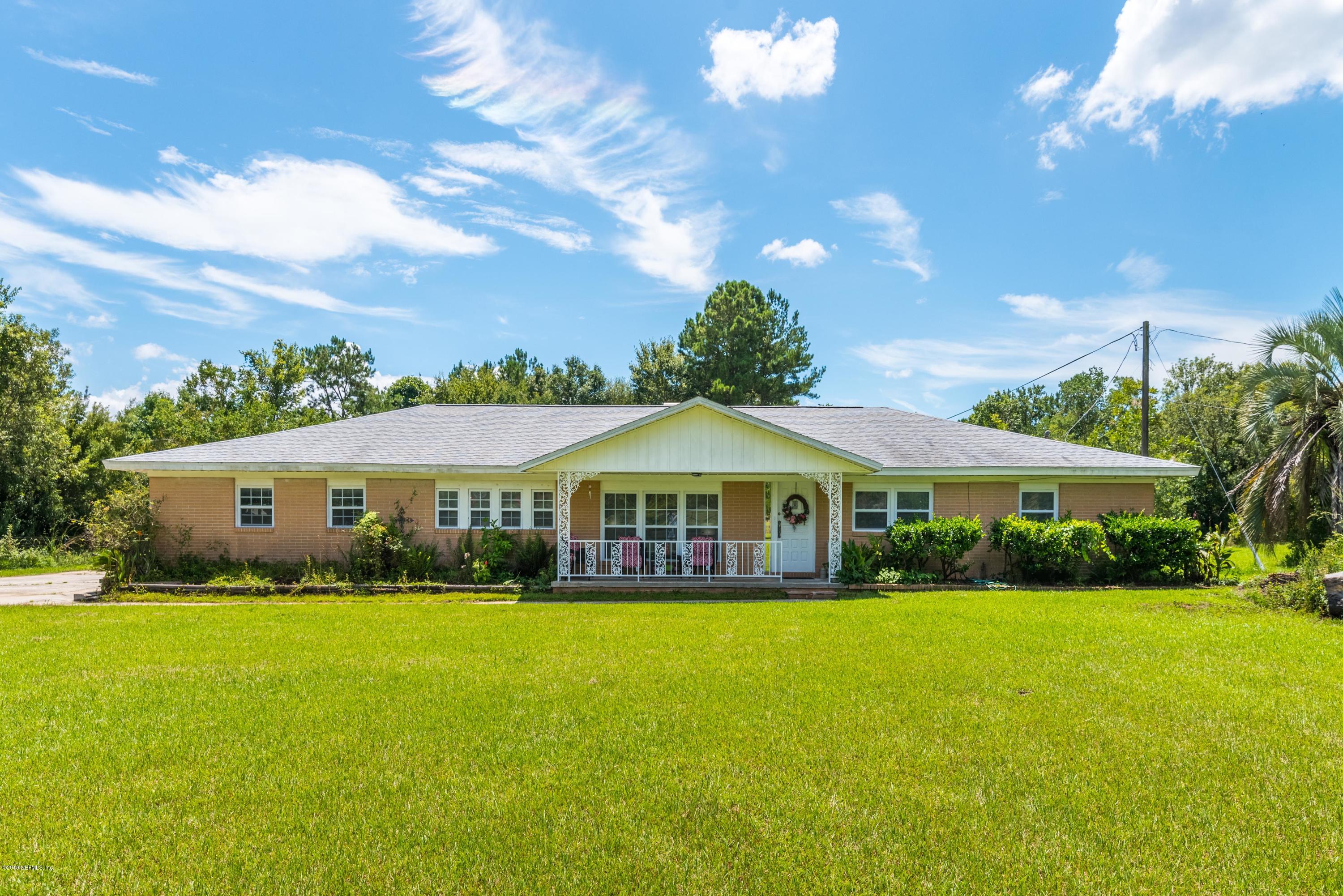 54152 Snyder Road Callahan, FL 32011 - Photo 6 of 39 a front view of house with yard and green space