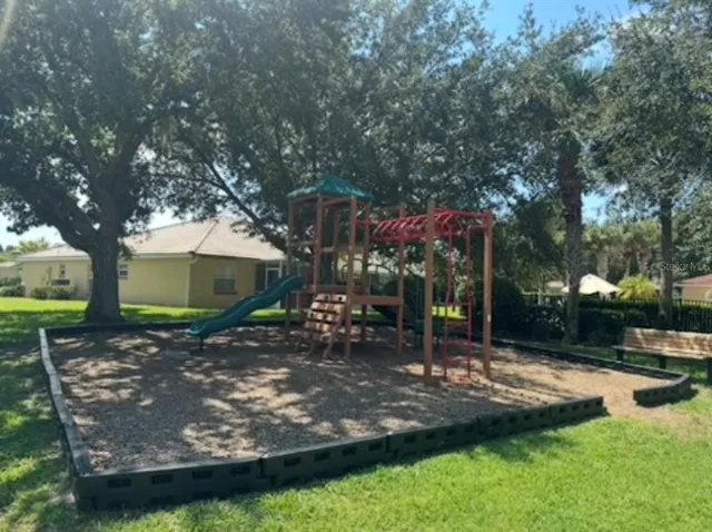 a view of a park with tree s