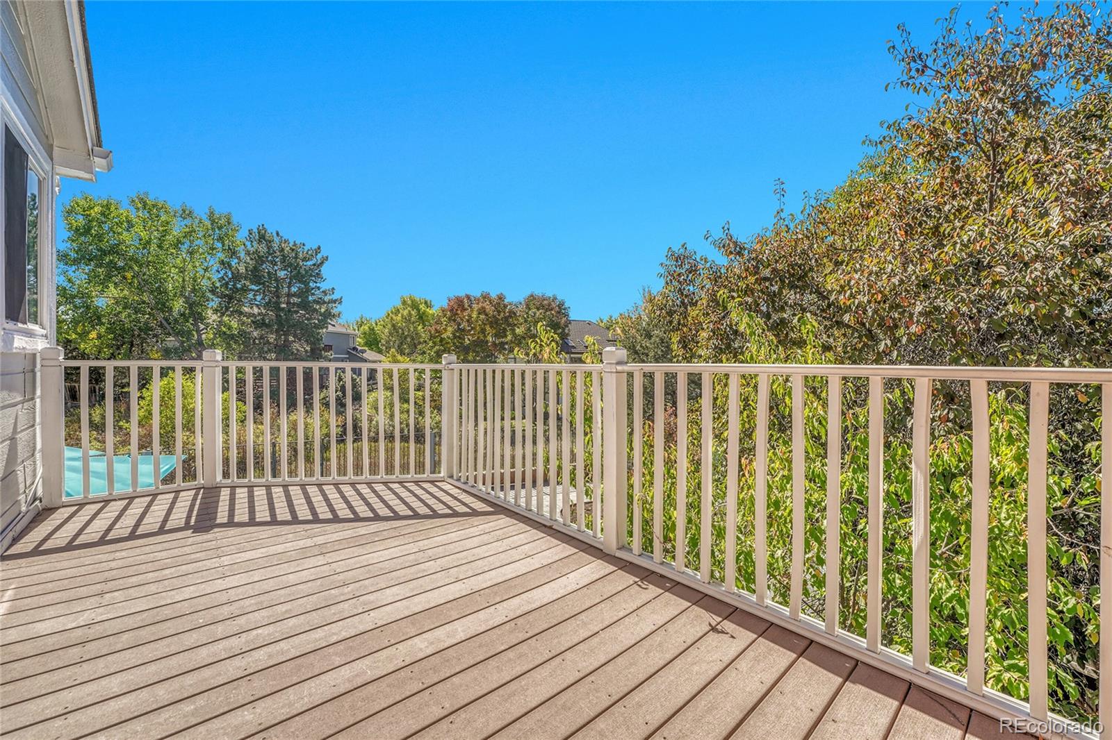 6722 Eagle Place Highlands Ranch, CO 80130 - Photo 31 of 47 a view of a wooden fence