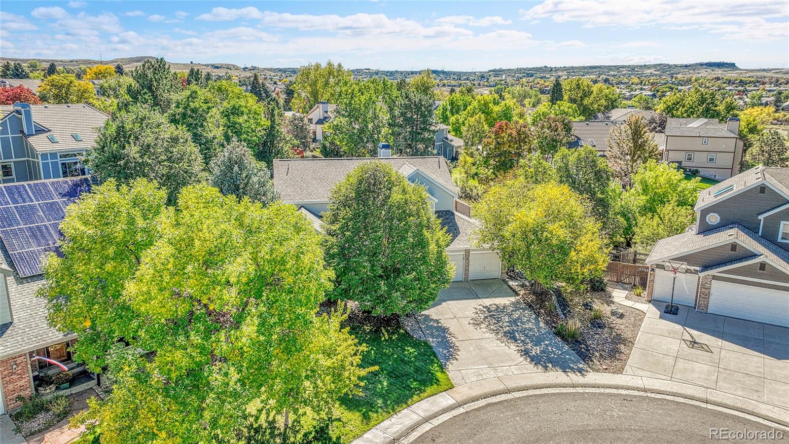 6722 Eagle Place Highlands Ranch, CO 80130 - Photo 36 of 47 a view of a garden with a lake view