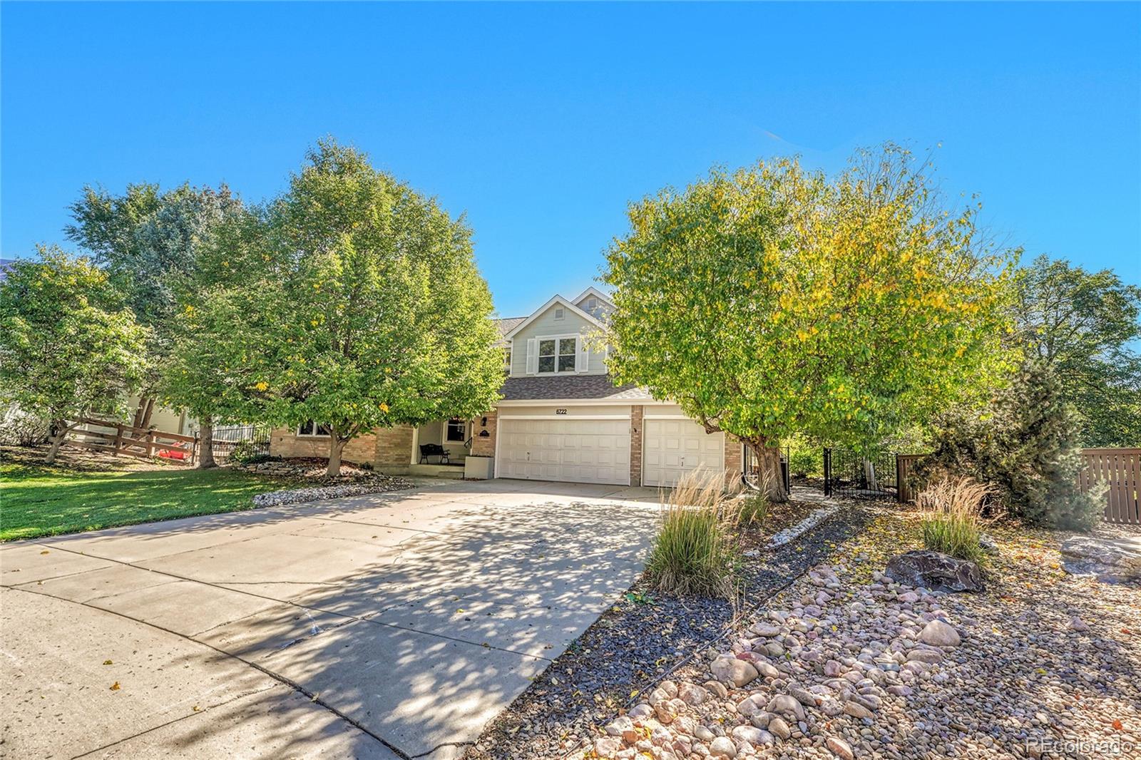 6722 Eagle Place Highlands Ranch, CO 80130 - Photo 5 of 47 a house view with a outdoor space