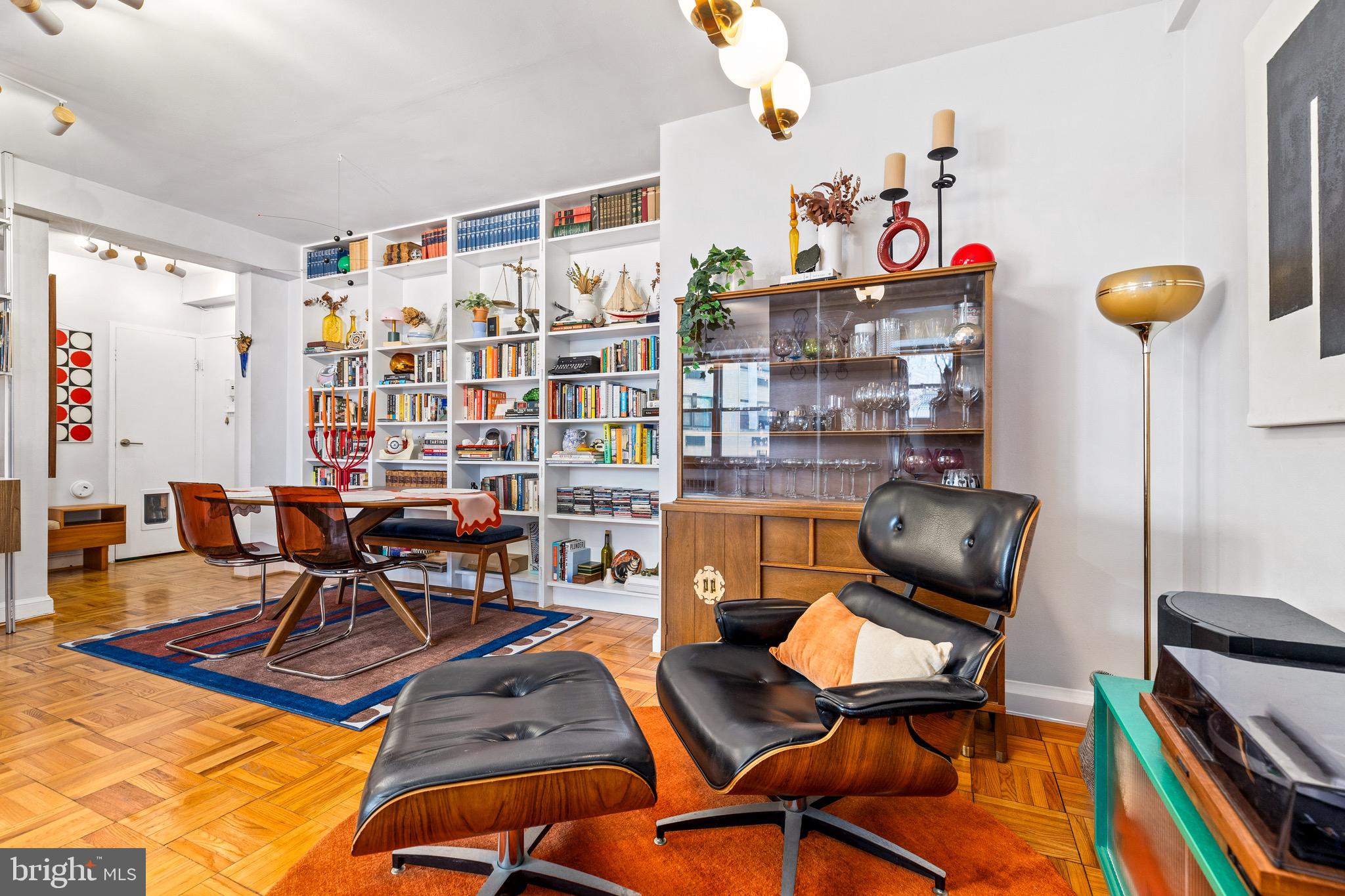 3025 Ontario Road Northwest, Unit 207 Washington, DC 20009 - Photo 5 of 15 a work room with furniture and gym equipment