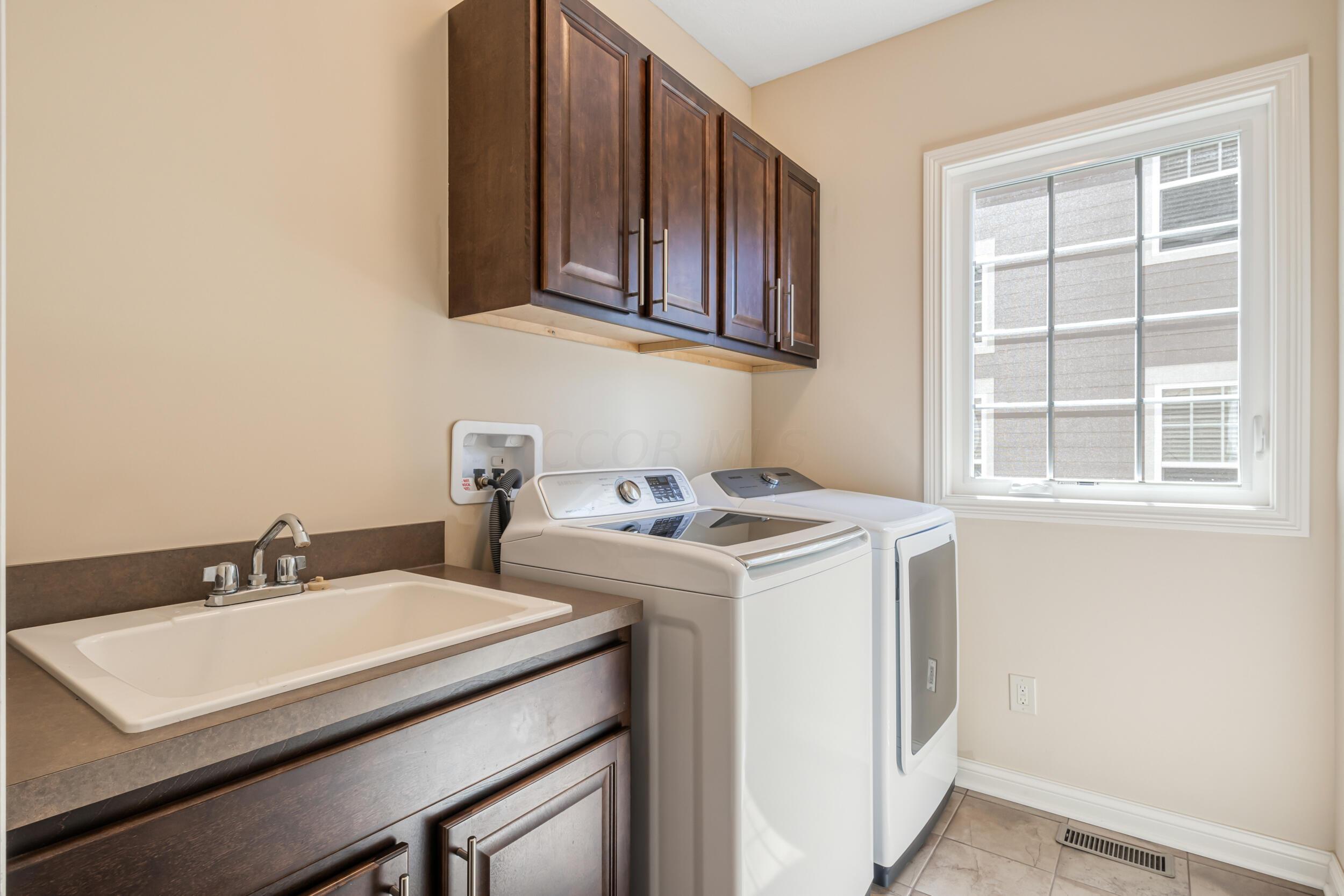 6731 Winemack Loop Dublin, OH 43016 - Photo 14 of 42 First floor laundry