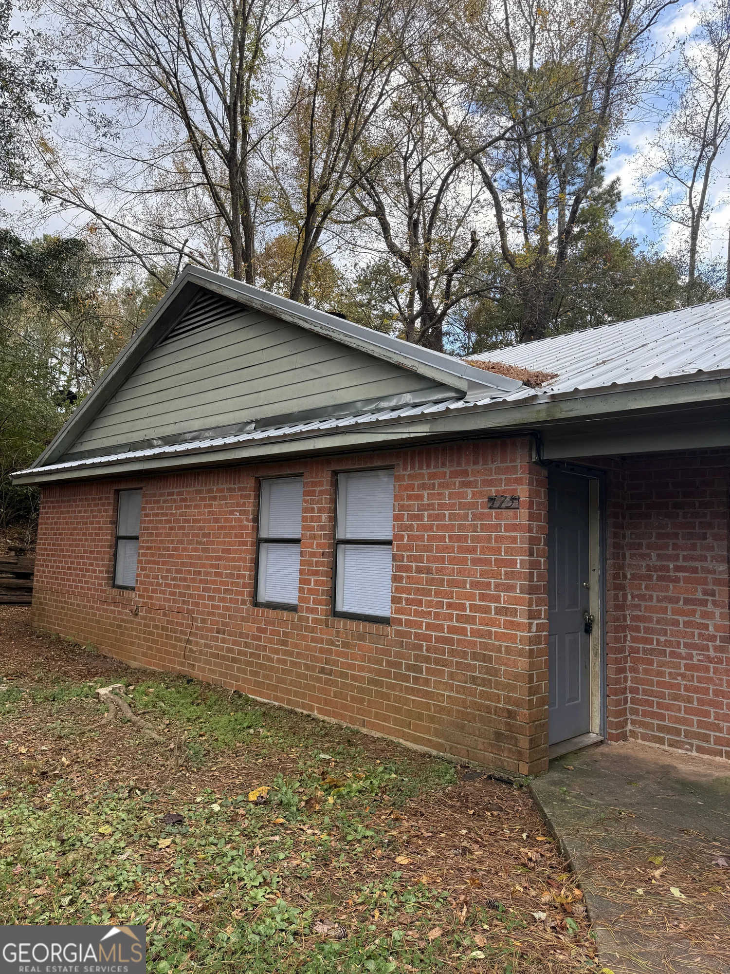 175 West Paces Drive Athens, GA 30605 - Photo 2 of 16 a front view of a house with a yard