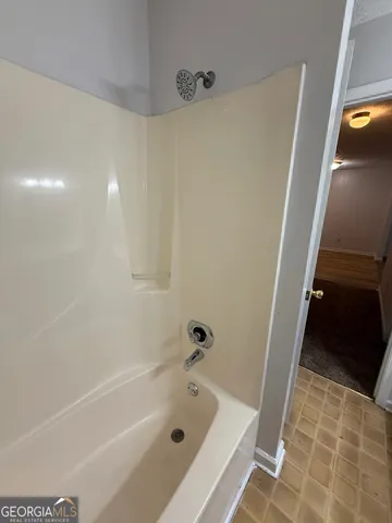 a bathroom with a bathtub