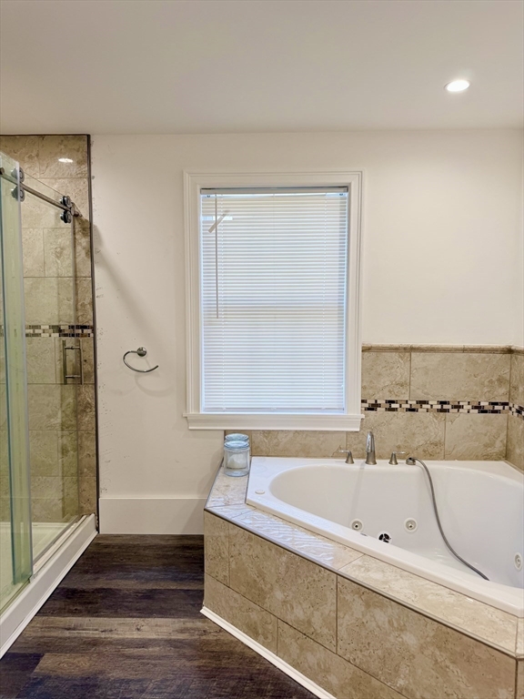 195 Lower Gore Road Webster, MA 01570 - Photo 13 of 24 a bathroom with a bathtub and a shower