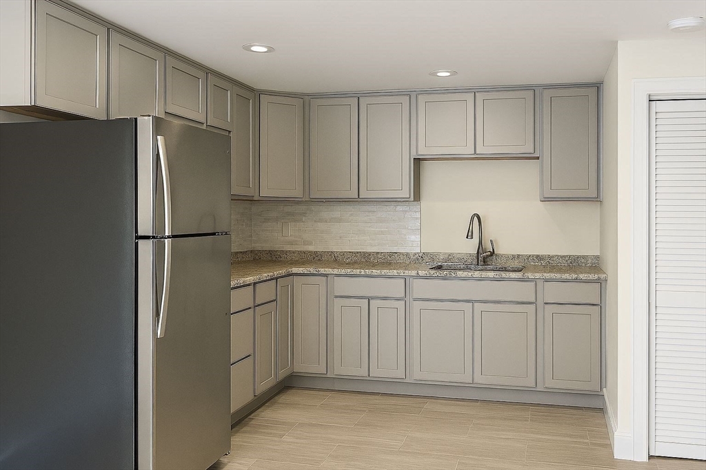 195 Lower Gore Road Webster, MA 01570 - Photo 16 of 24 a kitchen with stainless steel appliances granite countertop a refrigerator and a sink