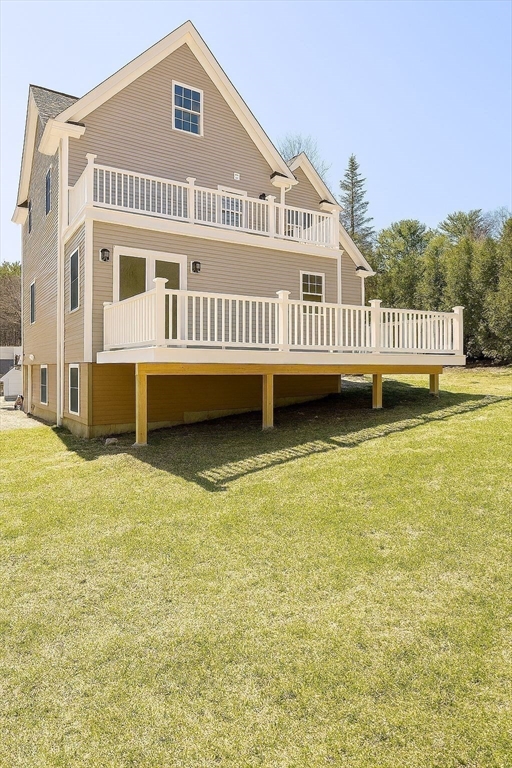 195 Lower Gore Road Webster, MA 01570 - Photo 23 of 24 a view of a house with a swimming pool and a yard