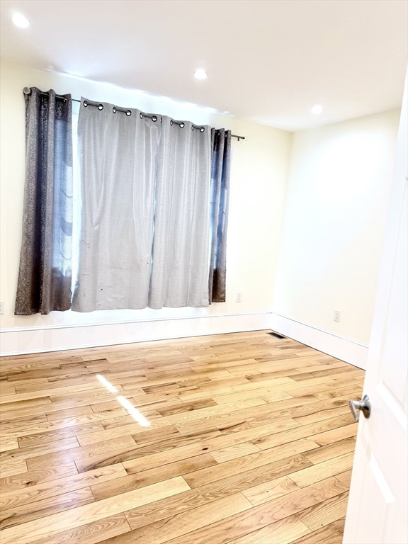 195 Lower Gore Road Webster, MA 01570 - Photo 6 of 24 a view of a livingroom with wooden floor