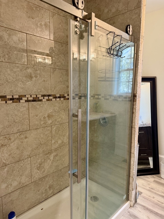 195 Lower Gore Road Webster, MA 01570 - Photo 7 of 24 a bathroom with a glass door shower