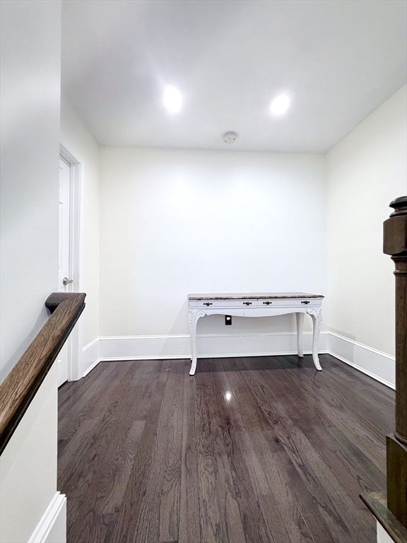 195 Lower Gore Road Webster, MA 01570 - Photo 10 of 24 a room with a wooden floor and a table