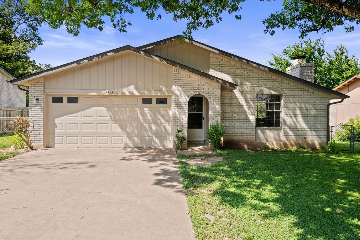 a view of a back yard of the house