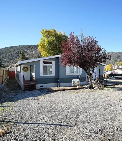 front view of a house with a patio