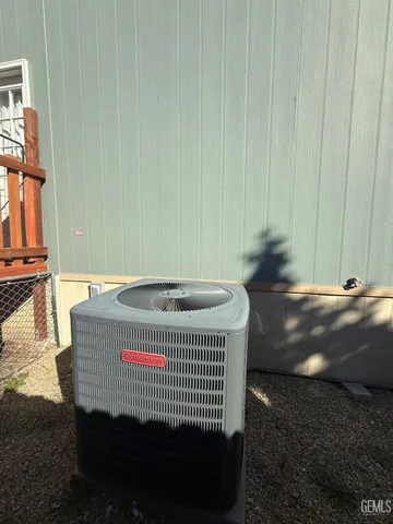 a view of a house with a snow in the background