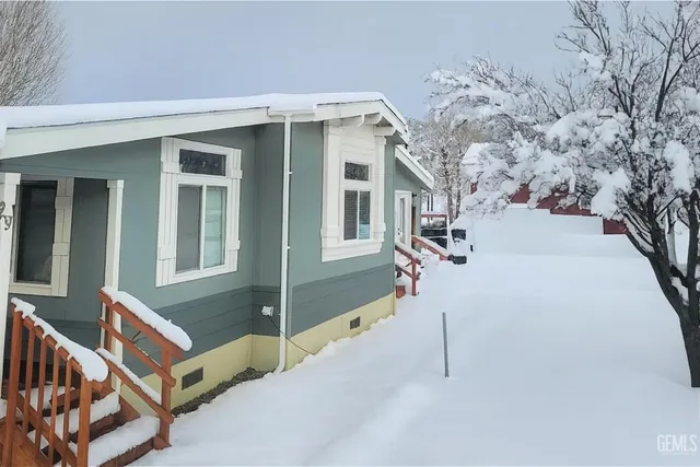 a view of a street with a building in the background