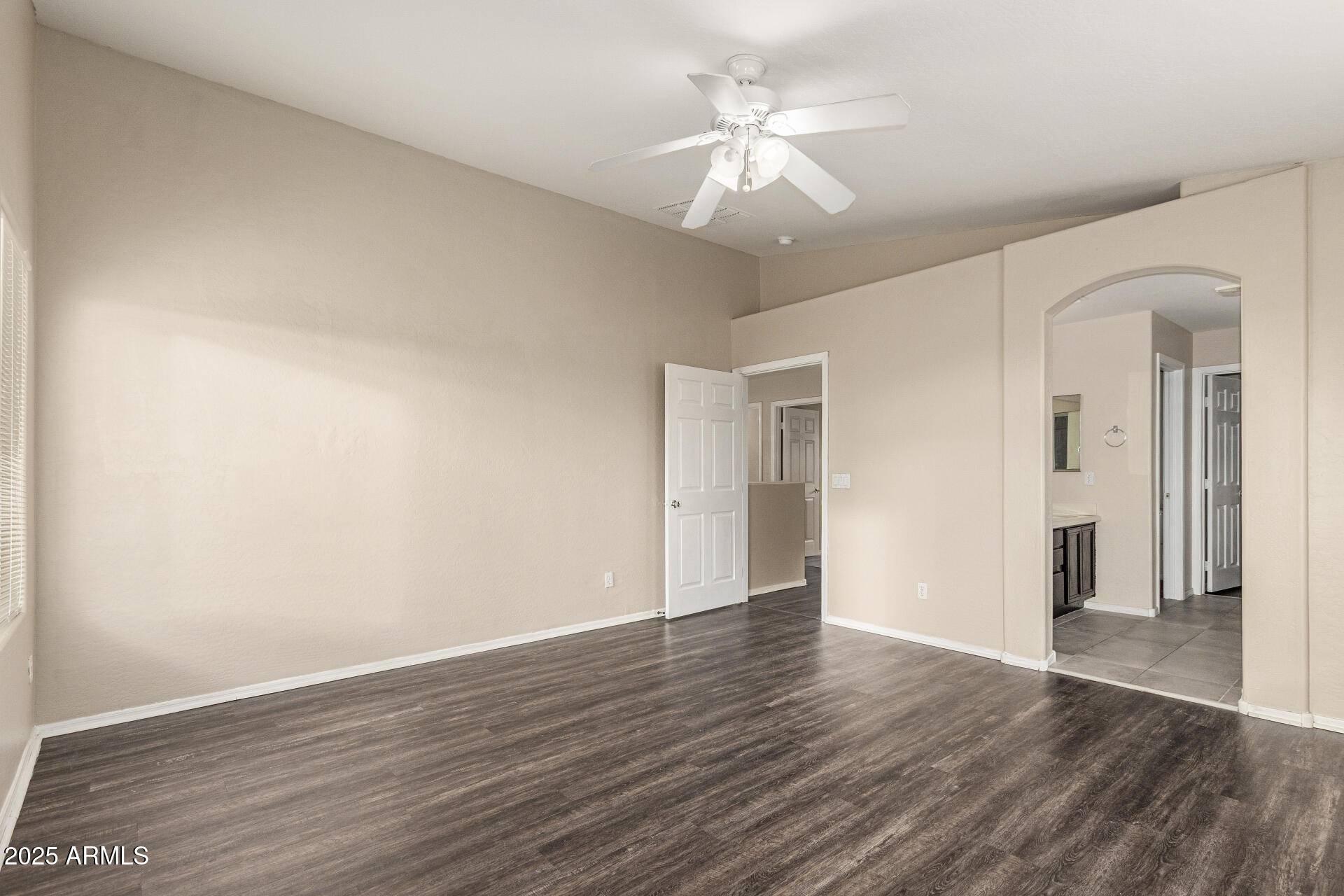 3545 East Crescent Way Gilbert, AZ 85298 - Photo 17 of 39 a view of an empty room with wooden floor