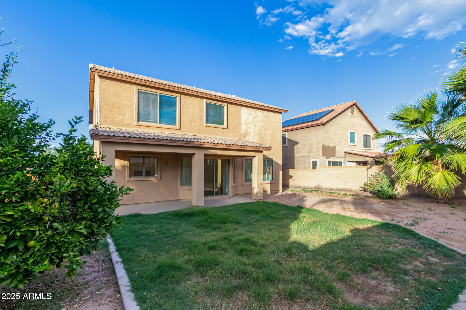3545 East Crescent Way Gilbert, AZ 85298 - Photo 39 of 39 a front view of a house with a yard and trees