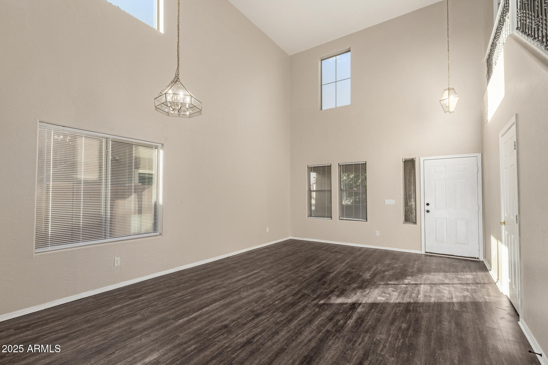 3545 East Crescent Way Gilbert, AZ 85298 - Photo 4 of 39 a view of empty room with wooden floor and window