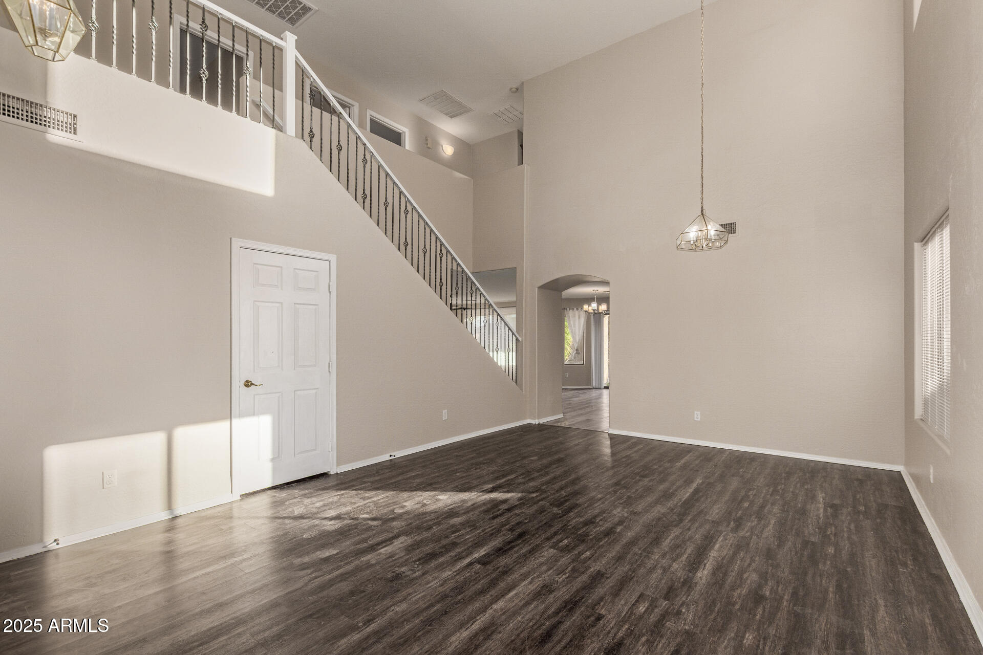 3545 East Crescent Way Gilbert, AZ 85298 - Photo 5 of 39 a view of an entryway with wooden floor