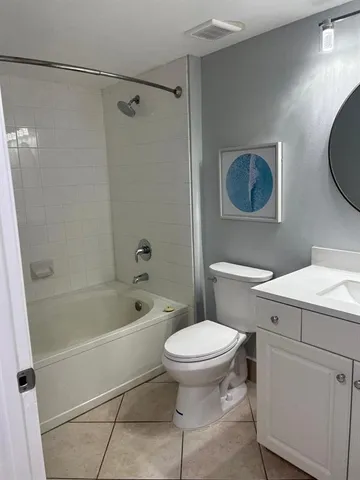 a view of swimming pool with outdoor seating