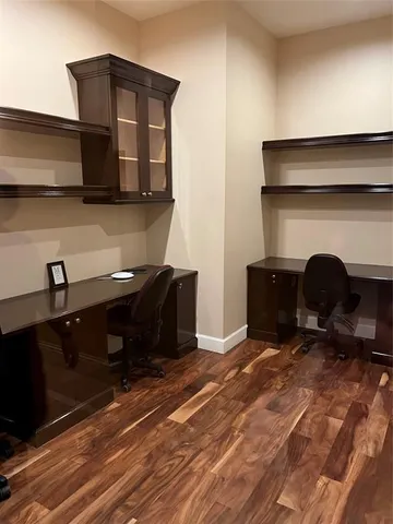 a view of living room with furniture and a fireplace