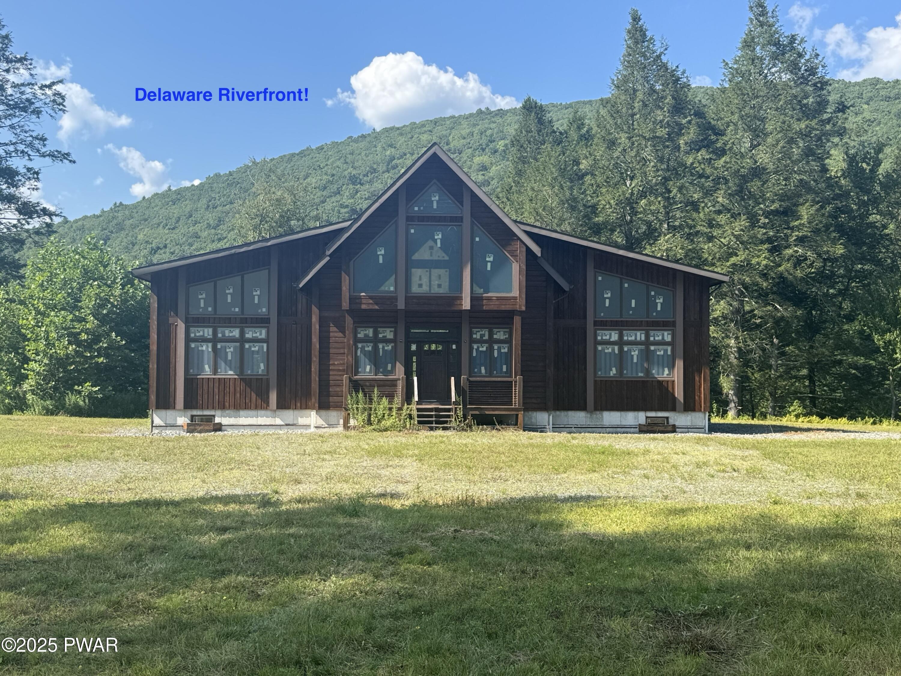 4382 River Road Equinunk, PA 18417 - Photo 1 of 50 Modern Riverfront Chalet
