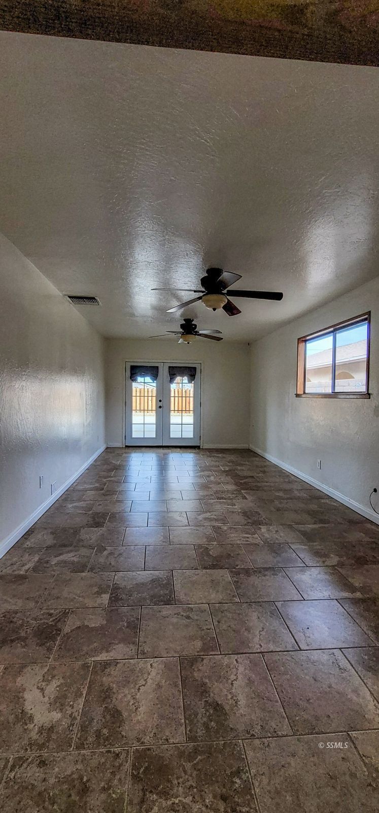 544 Weiman Avenue Ridgecrest, CA 93555 - Photo 7 of 20 a view of a livingroom with wooden floor